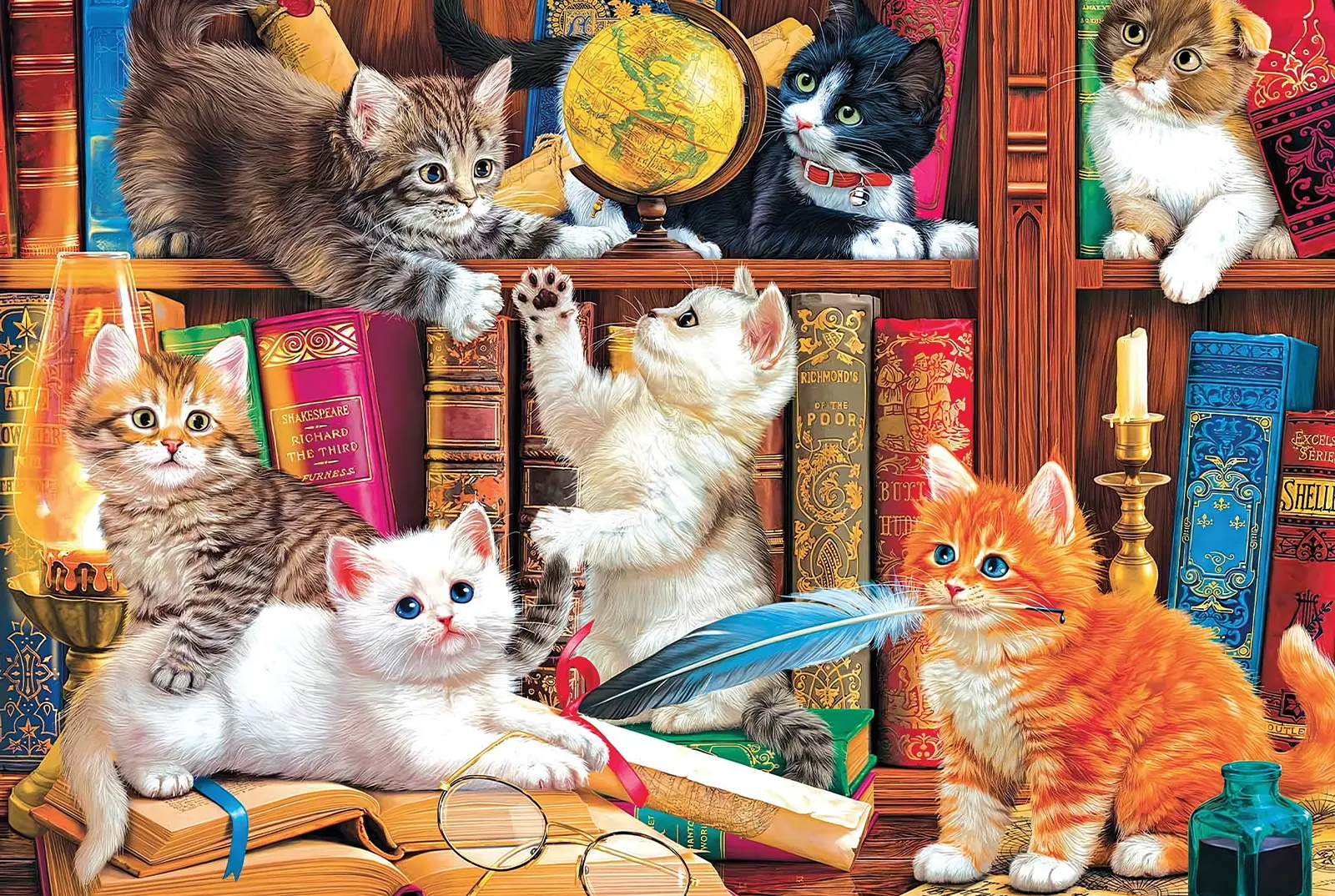 Playful kittens among colourful books, a globe, spectacles and a blue feather