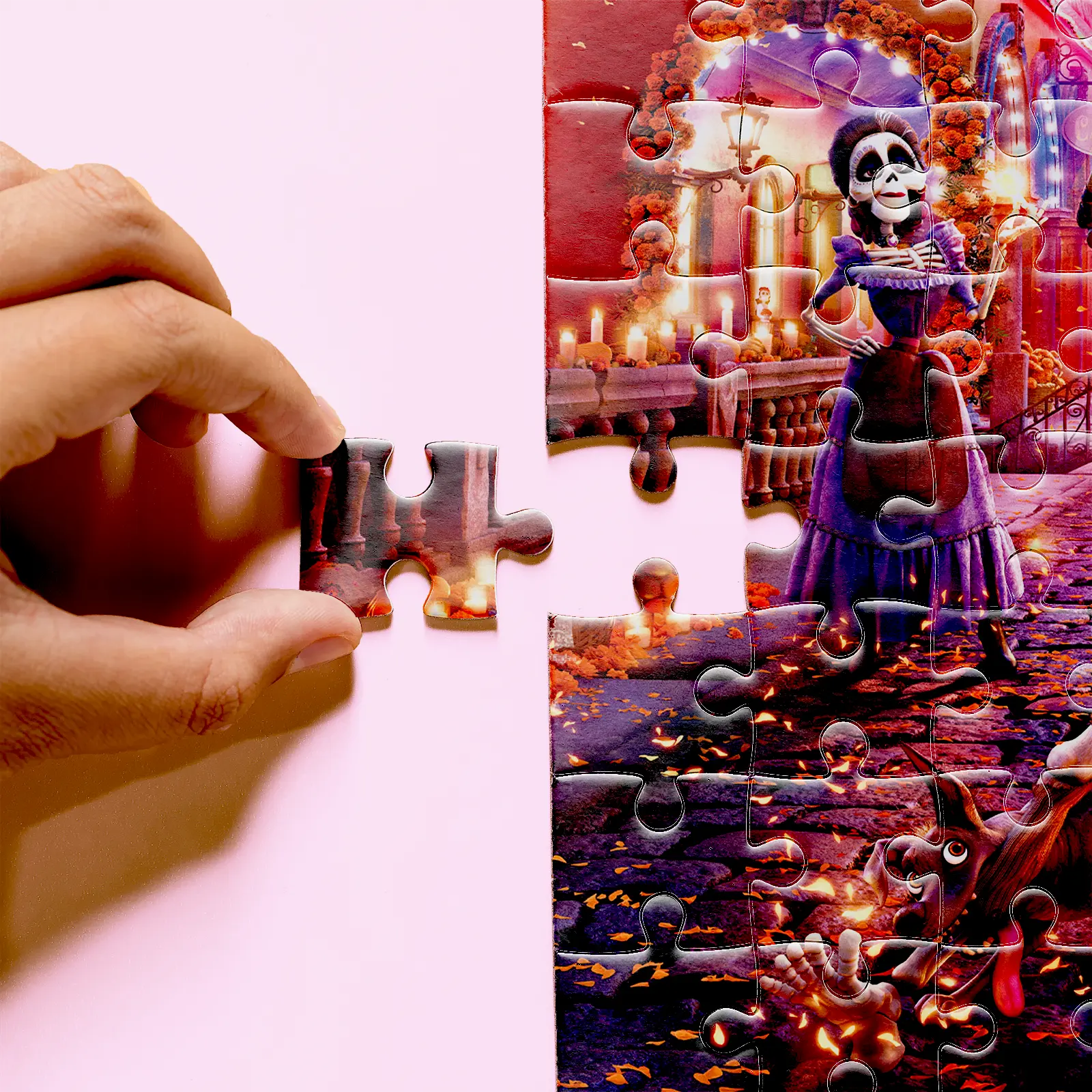 Hand holding a Coco puzzle piece beside a skeleton character in a purple dress